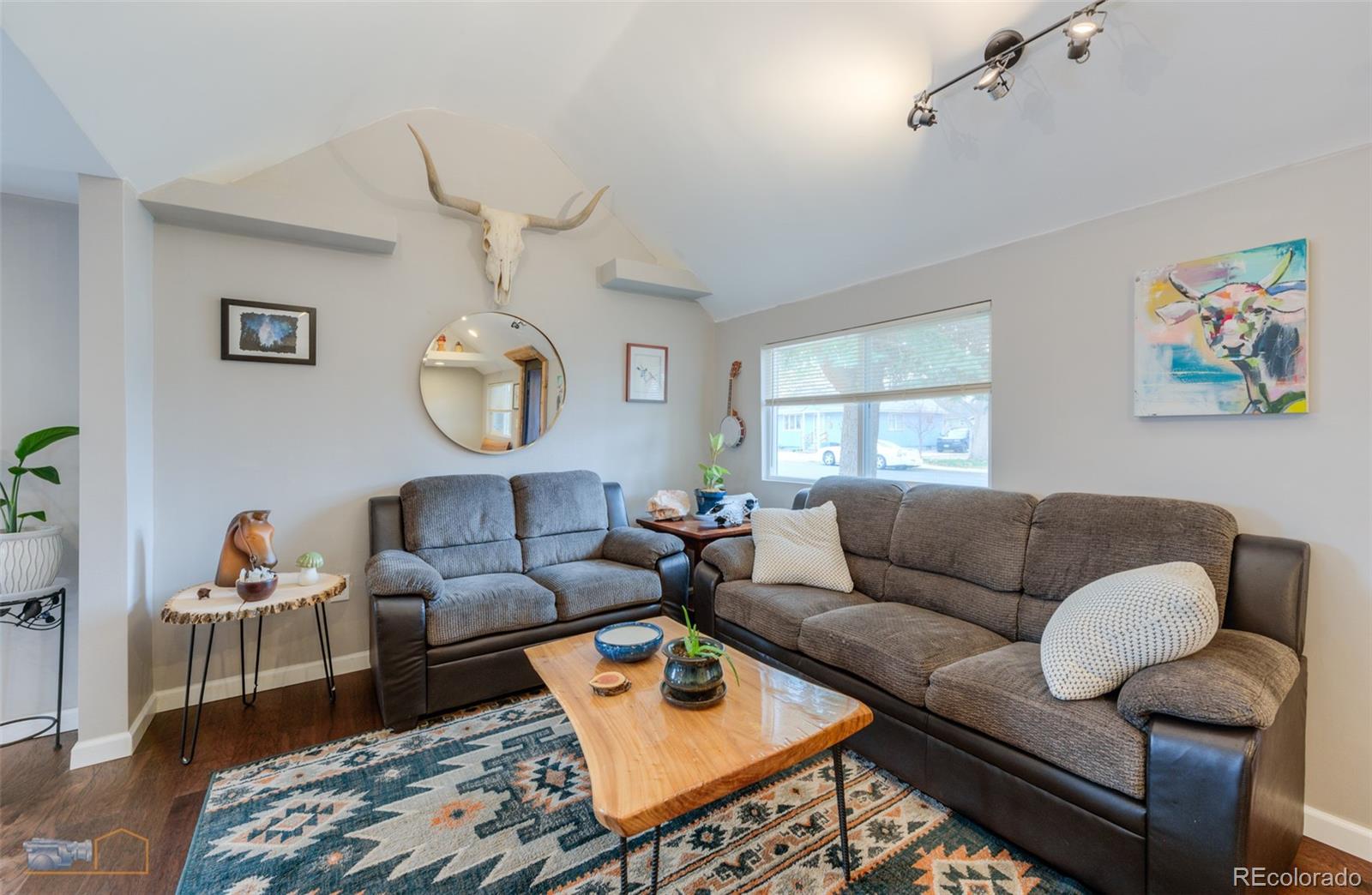 329 2nd Street Frederick, CO 80530 - Photo 12 of 49 a living room with furniture a rug and a window