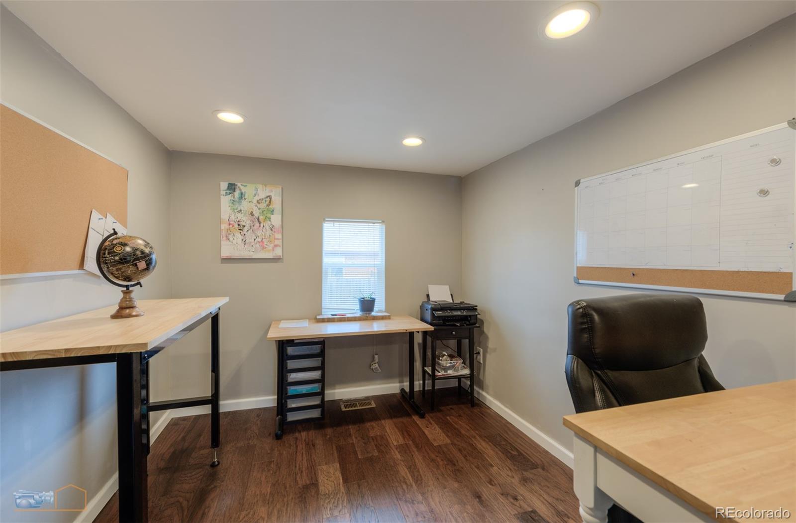 329 2nd Street Frederick, CO 80530 - Photo 25 of 49 a workspace with furniture and wooden floor
