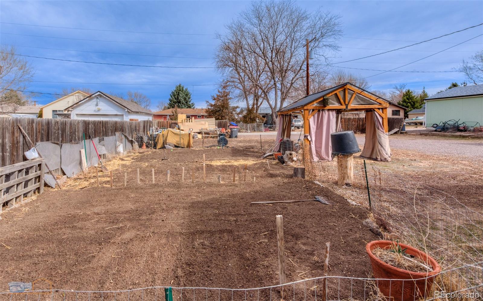 329 2nd Street Frederick, CO 80530 - Photo 28 of 49 a view of a house with a yard