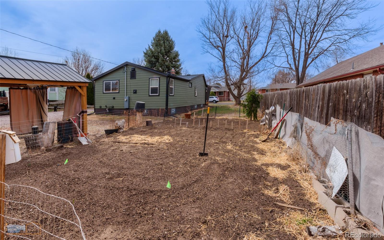 329 2nd Street Frederick, CO 80530 - Photo 29 of 49 a view of a house with a yard covered with snow