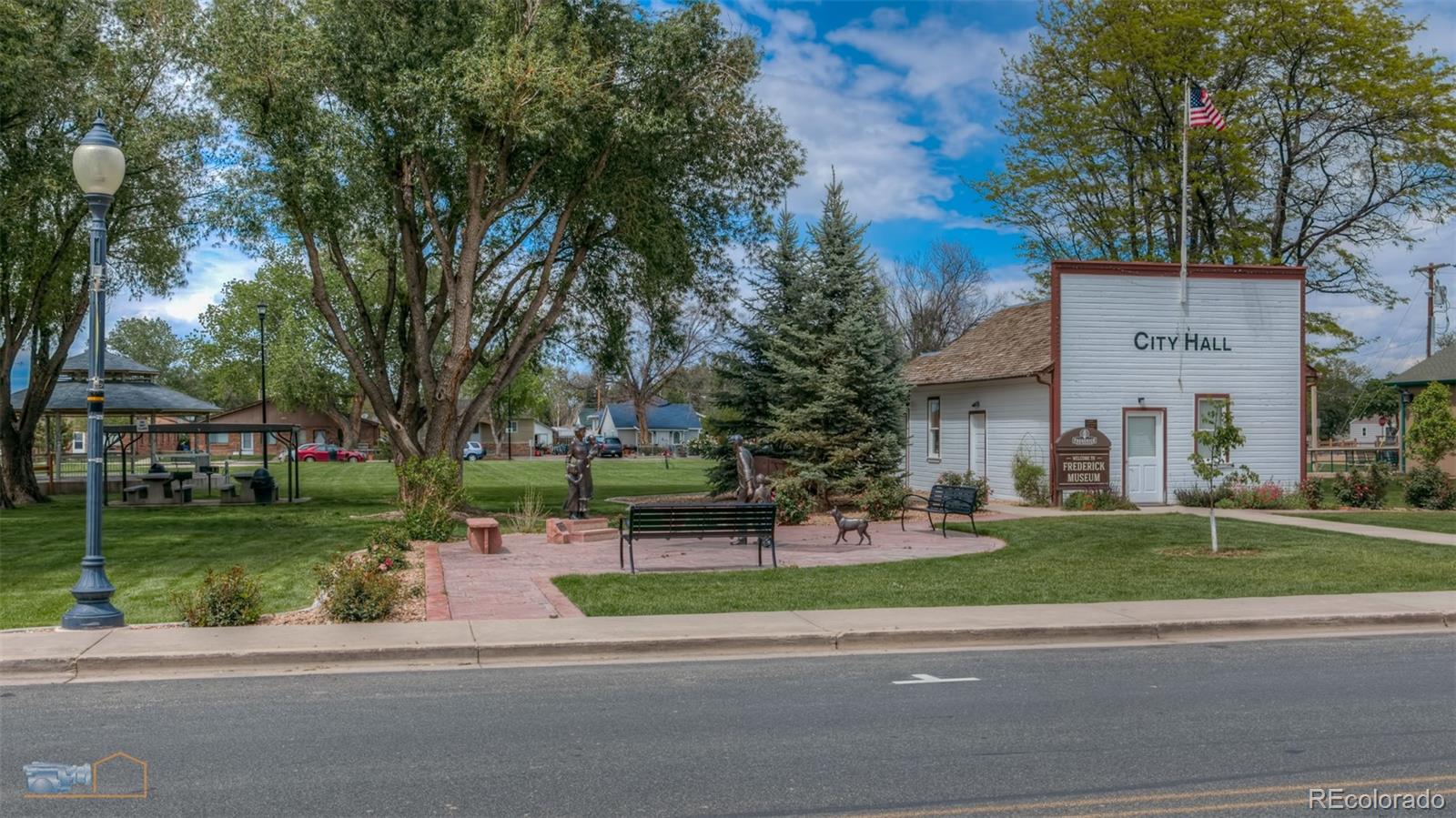 329 2nd Street Frederick, CO 80530 - Photo 42 of 49 a view of a house with a yard