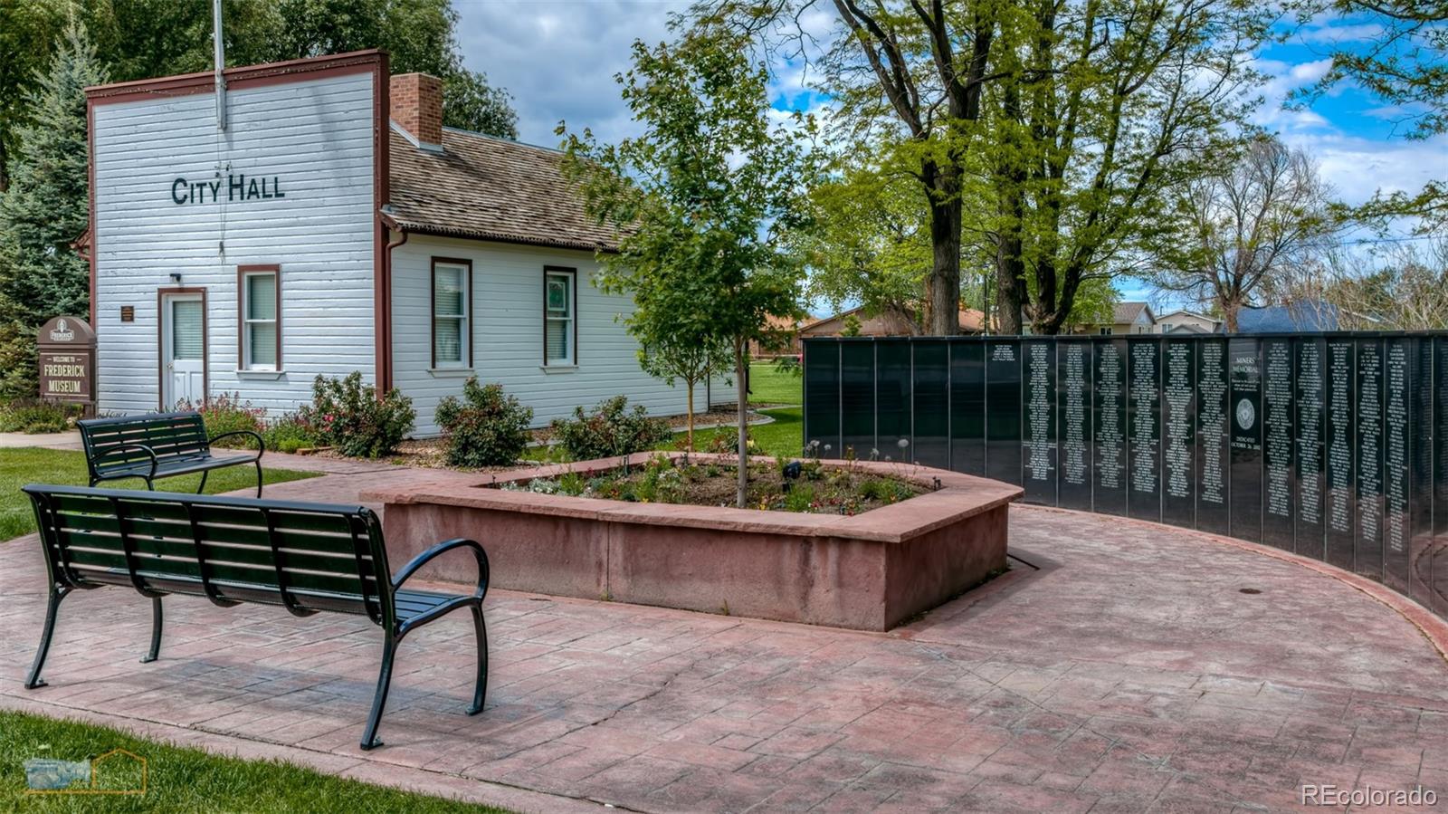 329 2nd Street Frederick, CO 80530 - Photo 43 of 49 a view of a chairs and table in the backyard