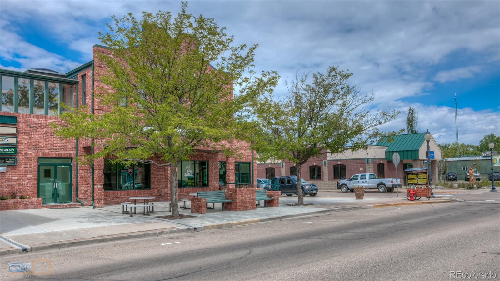 329 2nd Street Frederick, CO 80530 - Photo 45 of 49 front view of a building with a street