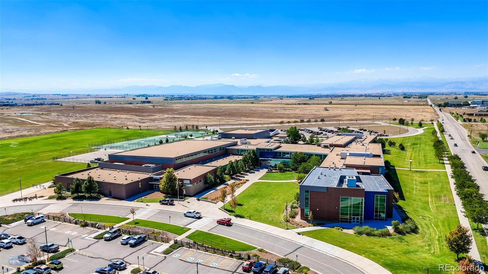 329 2nd Street Frederick, CO 80530 - Photo 46 of 49 an aerial view of a house with a ocean view