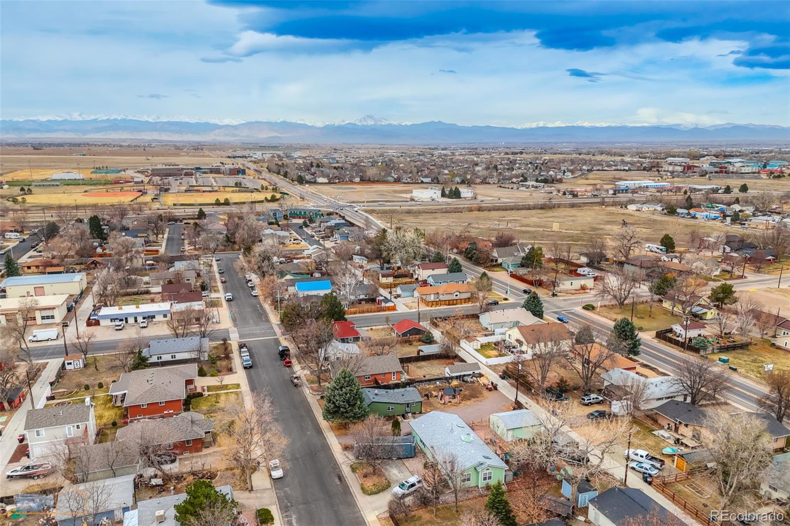 329 2nd Street Frederick, CO 80530 - Photo 5 of 49 an aerial view of a city