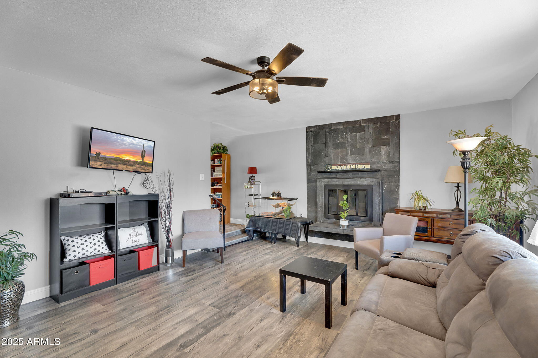 122 East Hermosa Drive Tempe, AZ 85282 - Photo 3 of 30 a living room with furniture and a fireplace