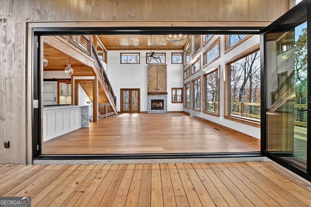 21 Mountain Trace Cherry Log, GA 30522 - Photo 11 of 49 wooden floor in an empty room with a window
