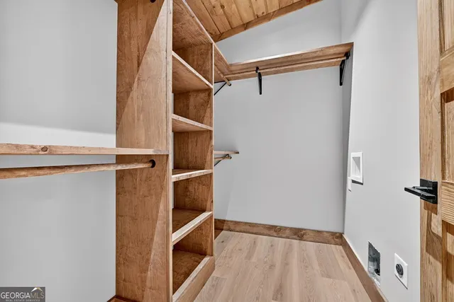 a bathroom with a bathtub and shower