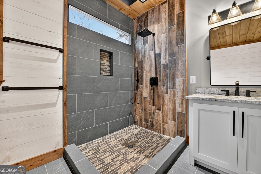 21 Mountain Trace Cherry Log, GA 30522 - Photo 25 of 49 a bathroom with a sink and a mirror