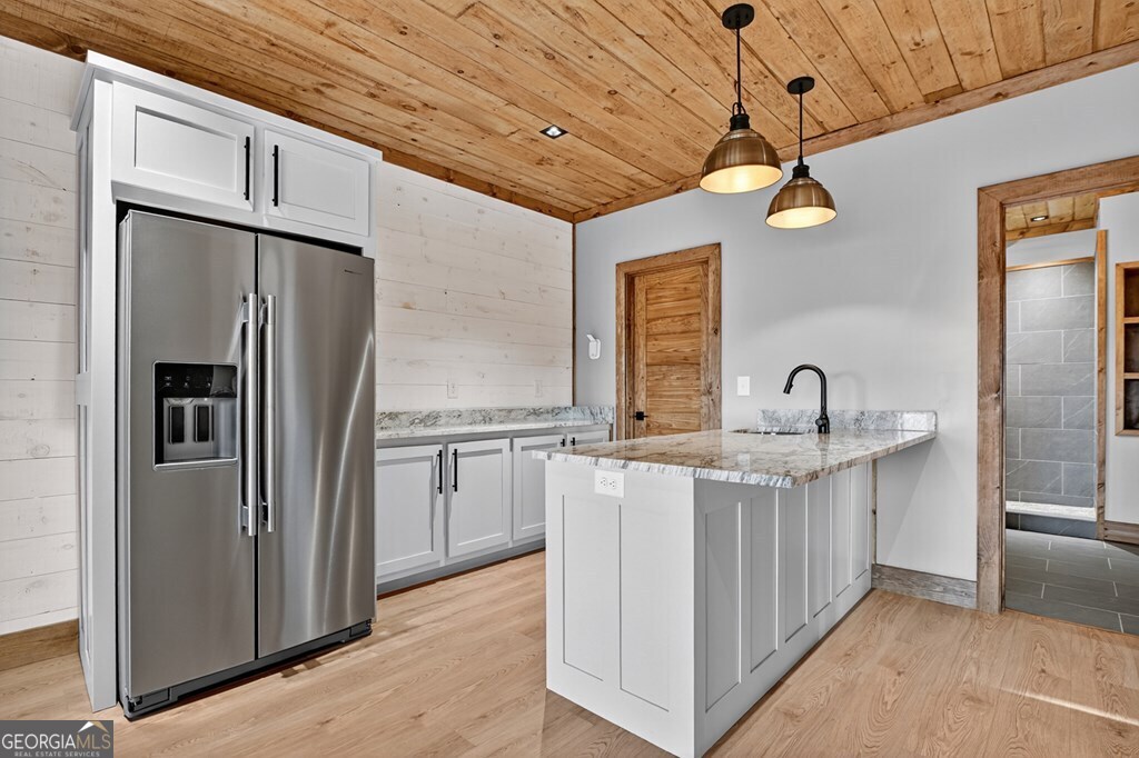 21 Mountain Trace Cherry Log, GA 30522 - Photo 38 of 49 a kitchen with stainless steel appliances granite countertop a refrigerator a sink and dishwasher