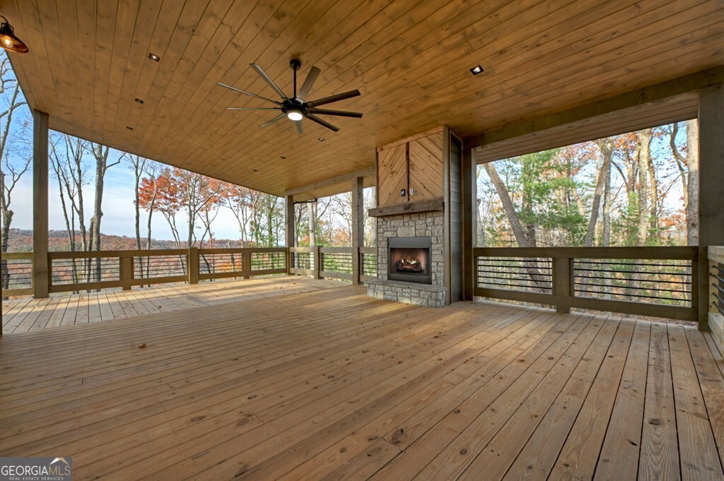 21 Mountain Trace Cherry Log, GA 30522 - Photo 45 of 49 a view of an empty room with wooden floor and a window