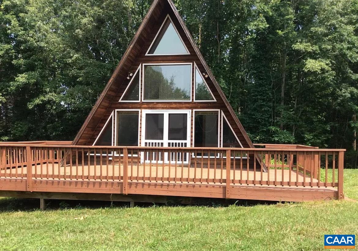 14639 Tower Road Unionville, VA 22567 - Photo 1 of 1 a view of a house with a yard and a deck