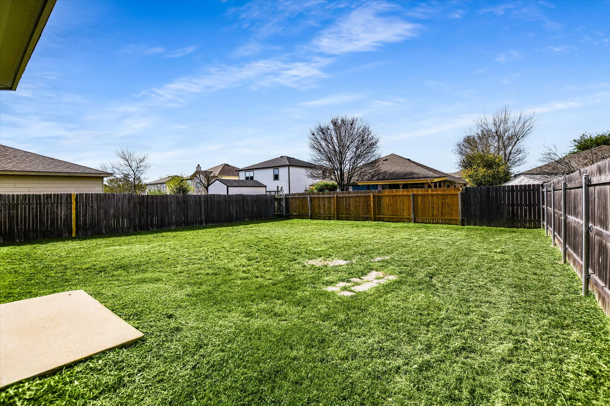 102 Blanco Woods Boulevard Elgin, TX 78621 - Photo 22 of 31 Full privacy fence in backyard