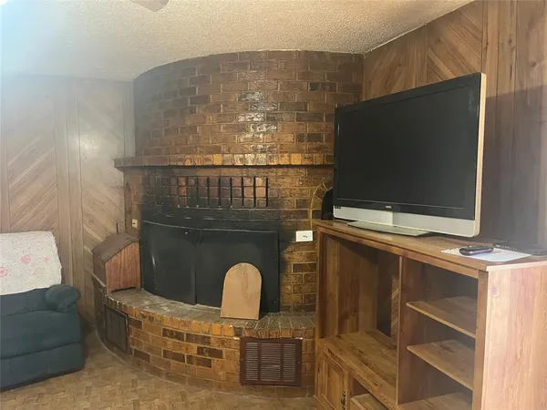 a kitchen with a table and chairs in it