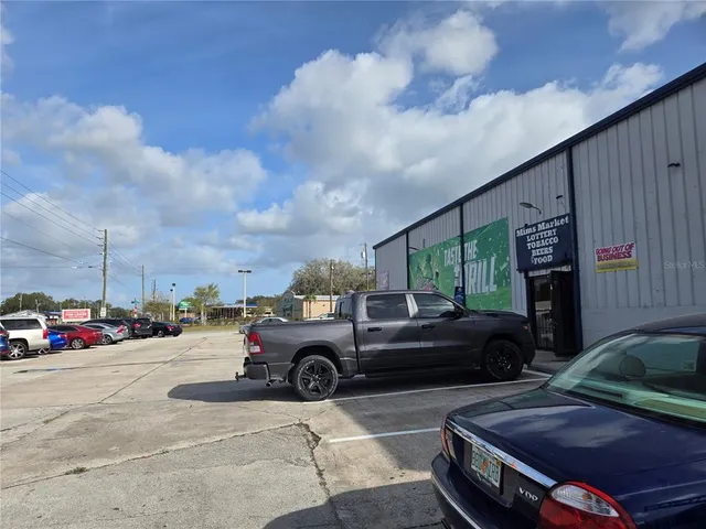 a view of car parked in front of house