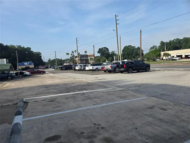 a view of a street with cars