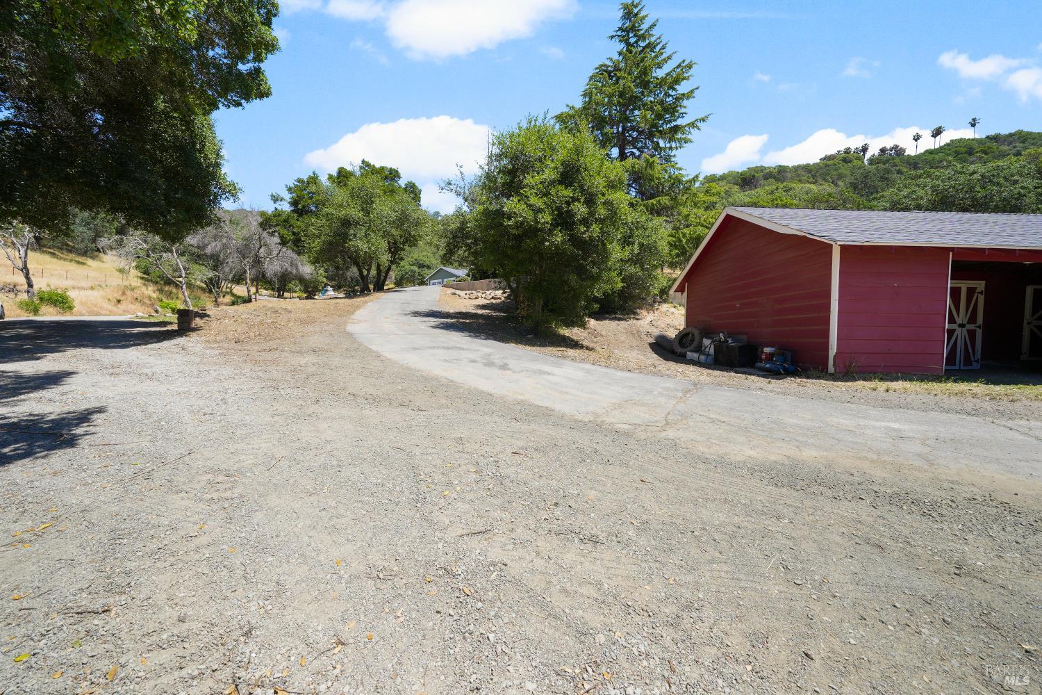 2129 Rockville Road Fairfield, CA 94534 - Photo 37 of 59 a view of a house with a yard and mountain view