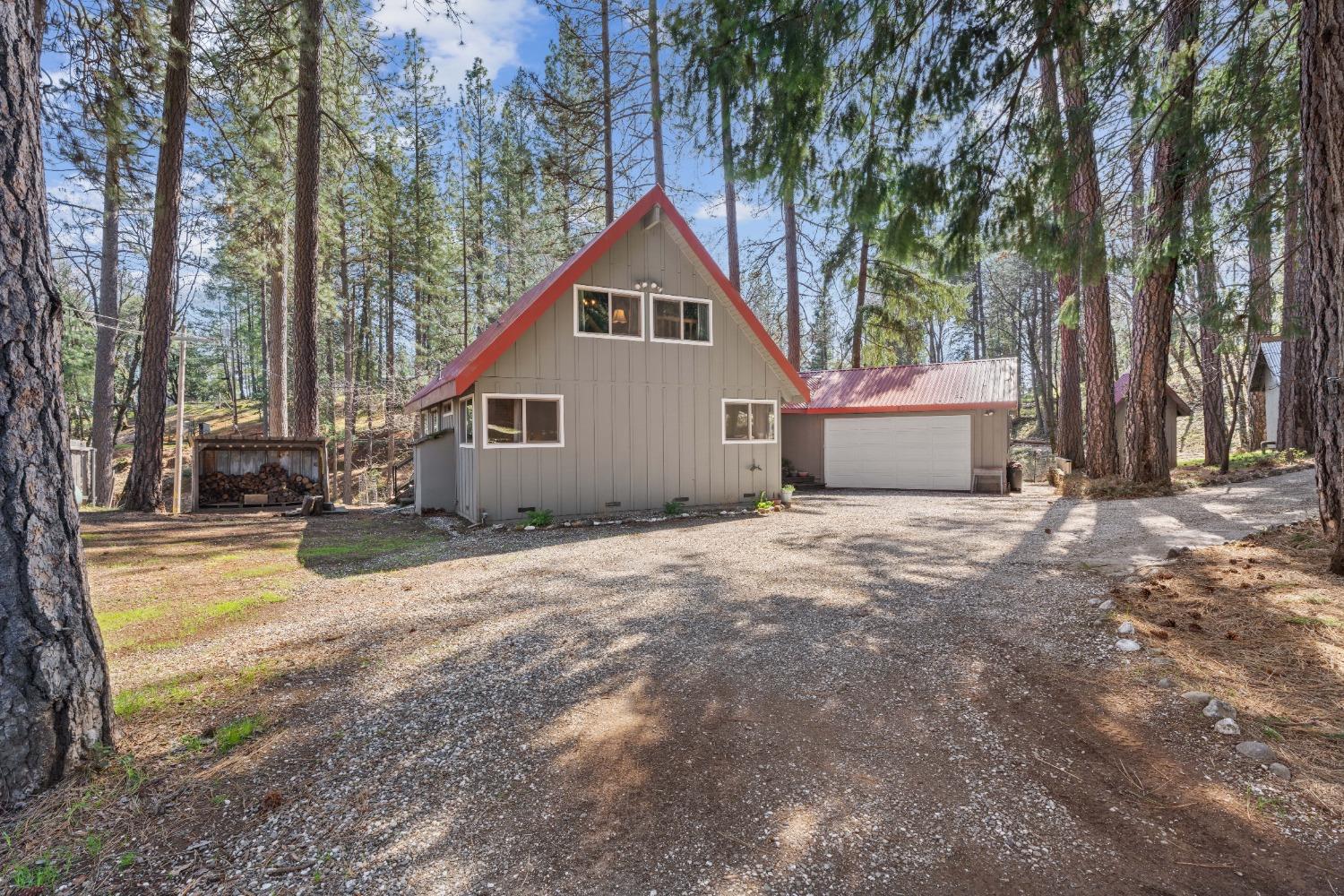 a house with trees in the background