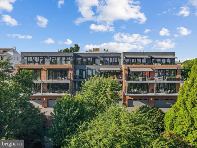 a large building with a clock tower in the middle