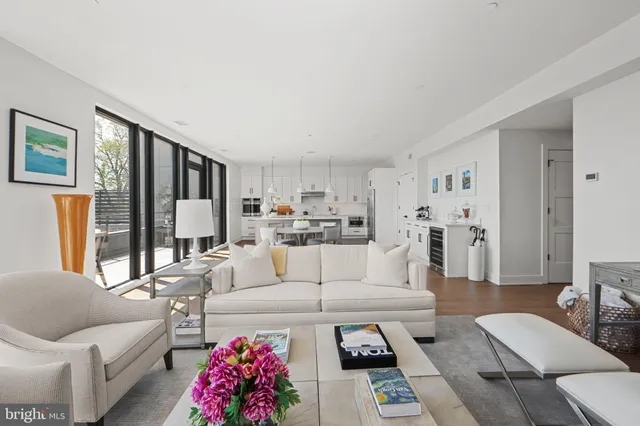 a view of a dining room with furniture and window