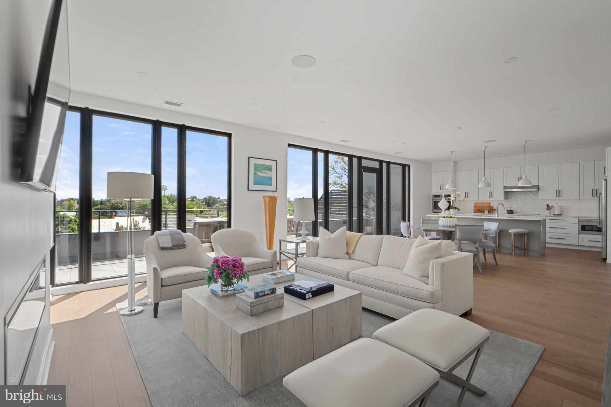 210 East 2nd Street, Unit 402 Frederick, MD 21701 - Photo 13 of 71 a living room with furniture and a large window