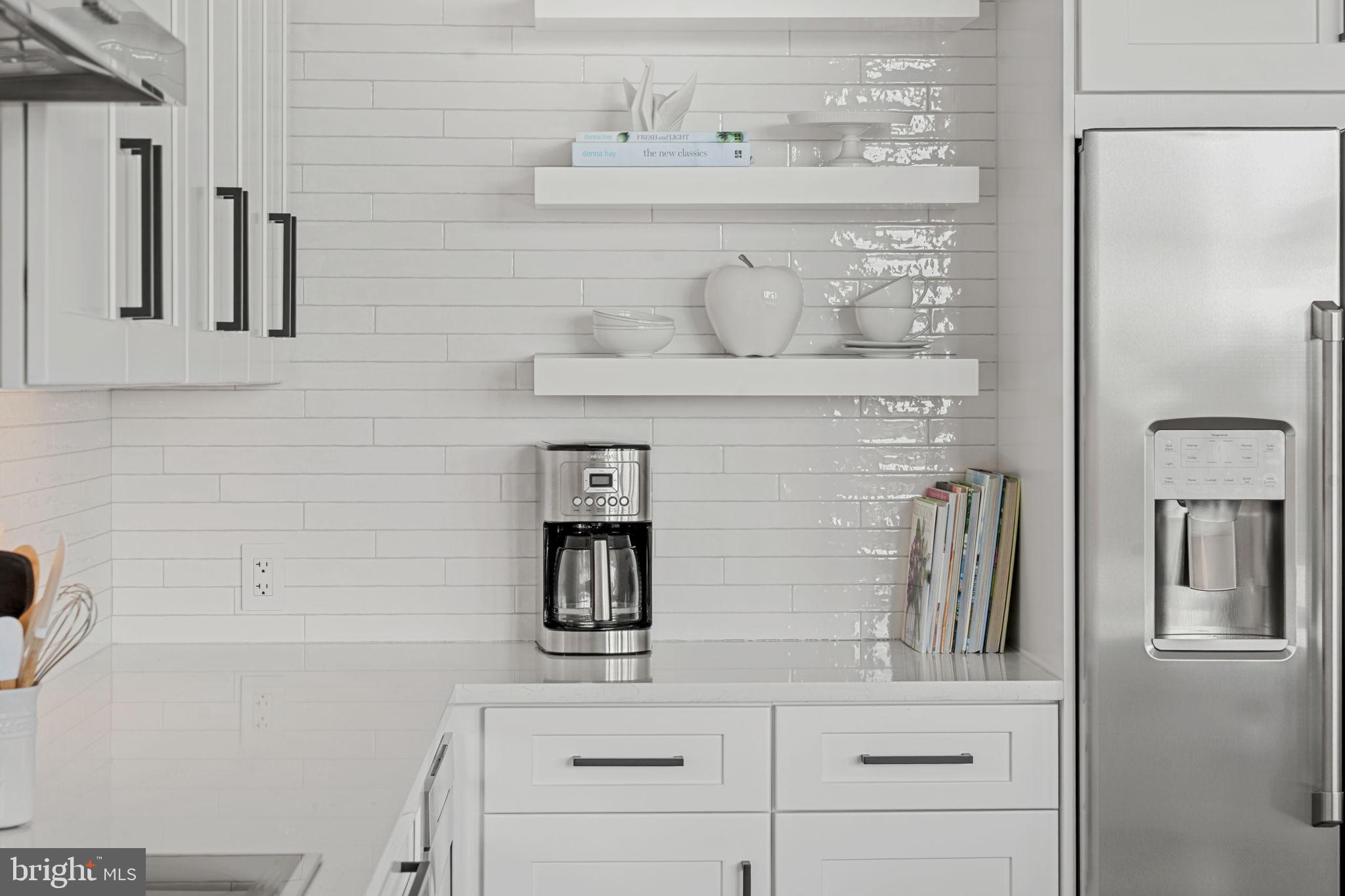 210 East 2nd Street, Unit 402 Frederick, MD 21701 - Photo 27 of 71 a bathroom with a sink and a mirror