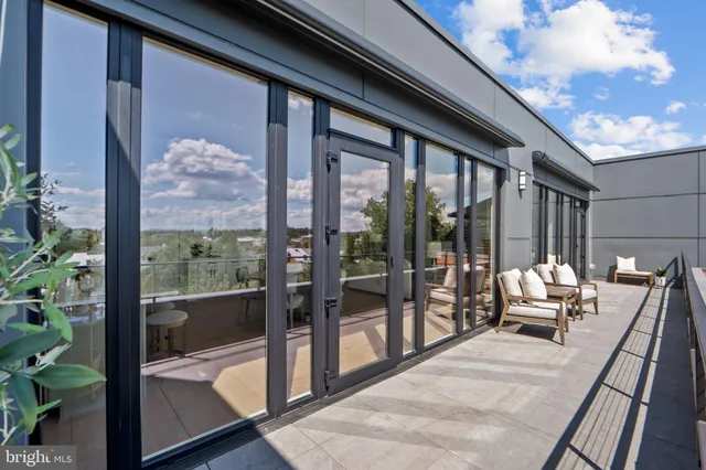 a bedroom with a bed and a lamp