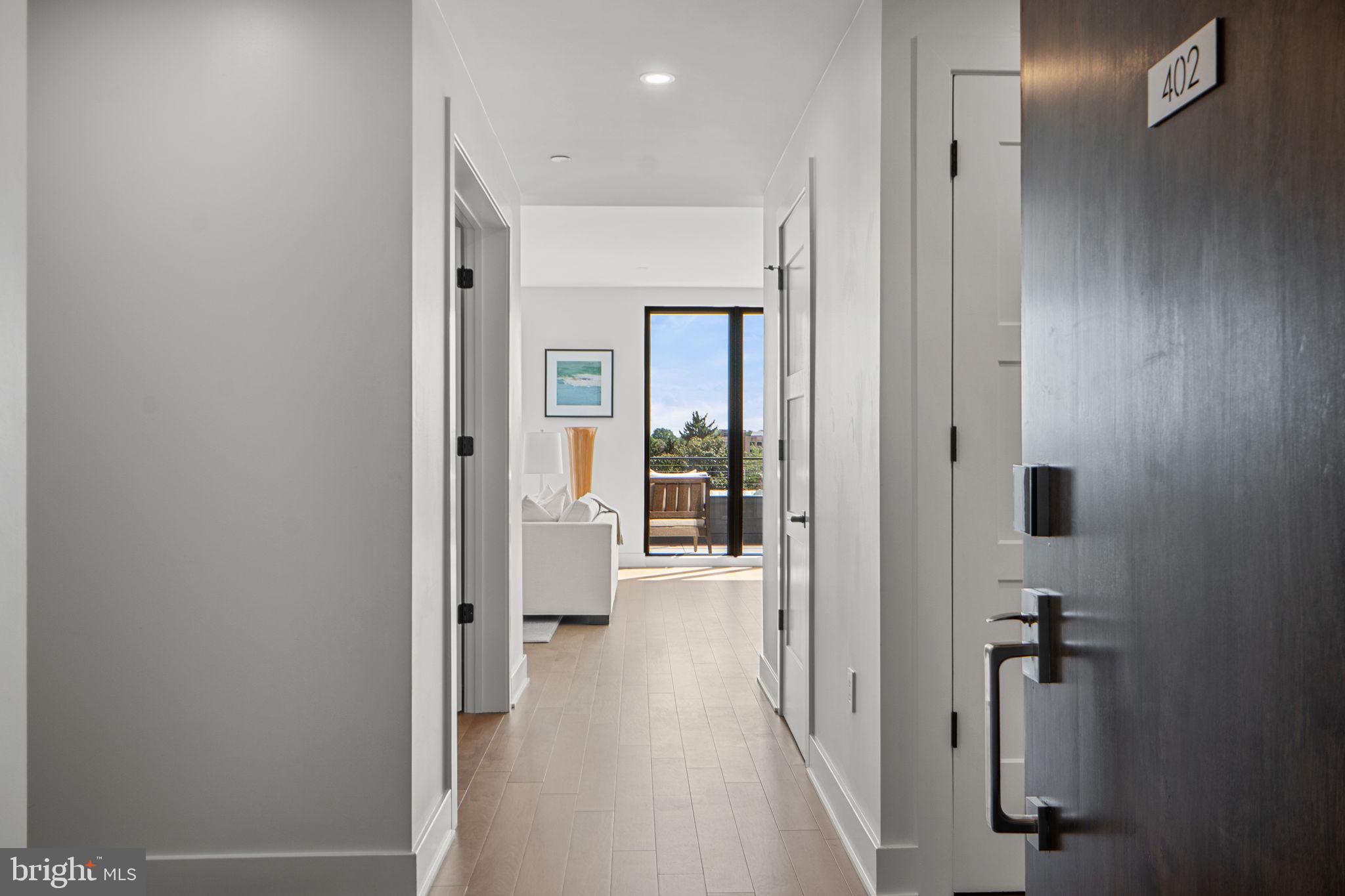 210 East 2nd Street, Unit 402 Frederick, MD 21701 - Photo 4 of 71 a view of a hallway with a room
