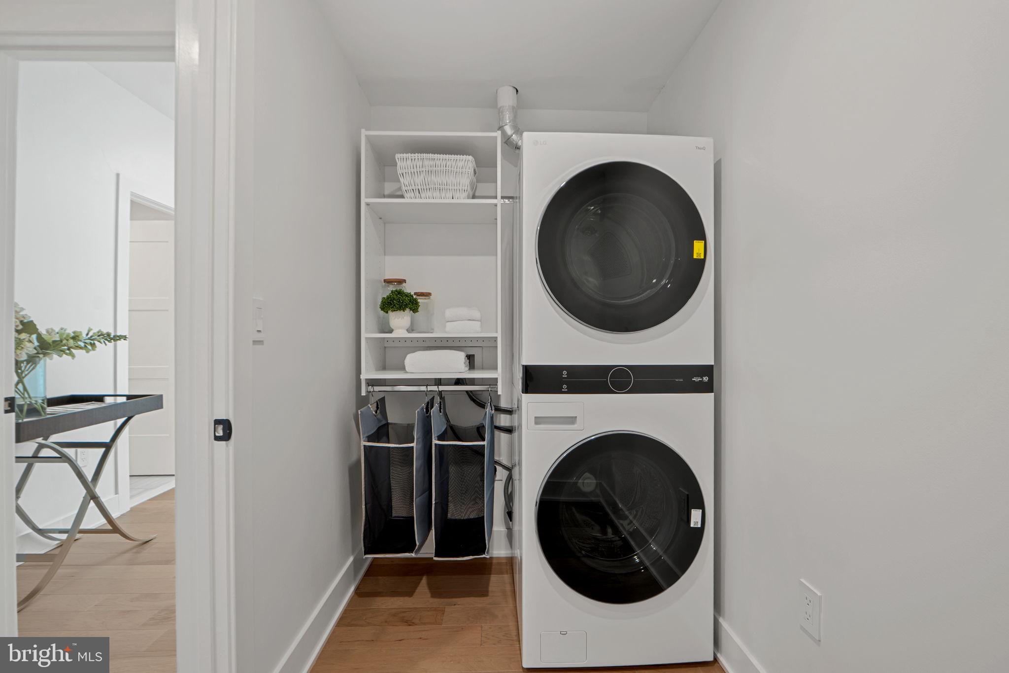 210 East 2nd Street, Unit 402 Frederick, MD 21701 - Photo 57 of 71 a utility room with dryer and washer