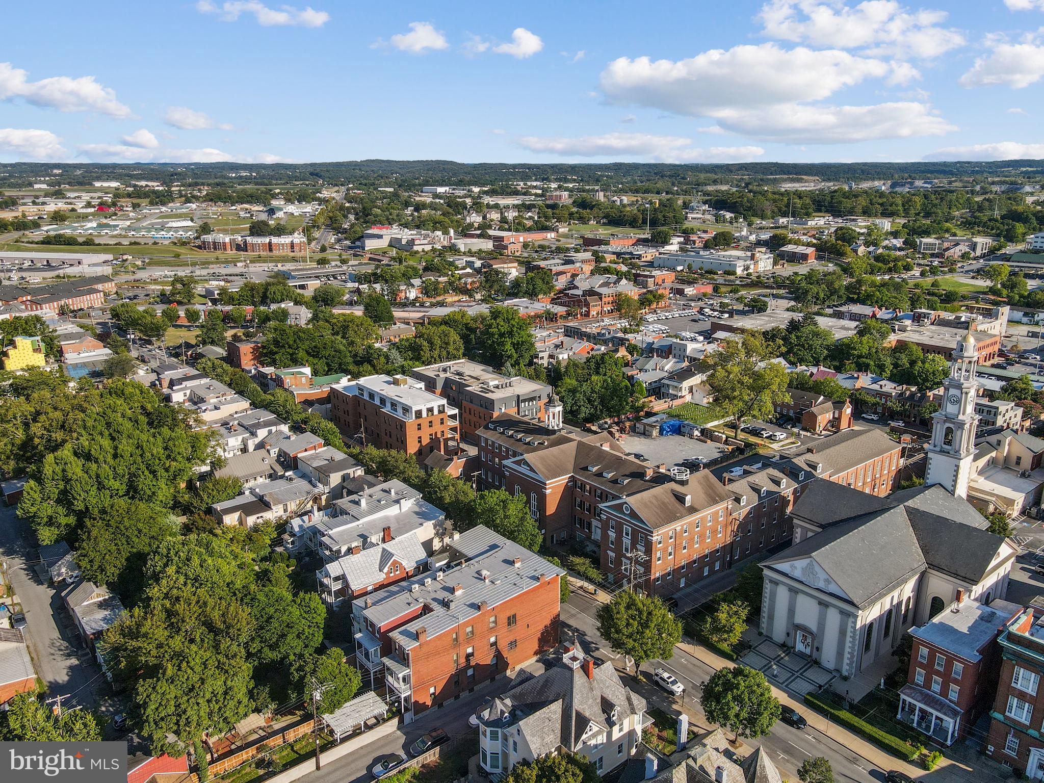 210 East 2nd Street, Unit 402 Frederick, MD 21701 - Photo 63 of 71 an aerial view of a city with lots of residential buildings