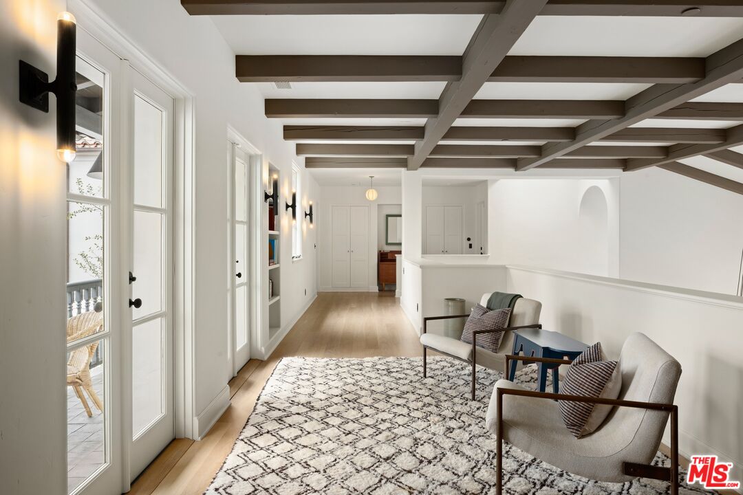 765 Ranch Lane Pacific Palisades, CA 90272 - Photo 17 of 23 a living room with furniture