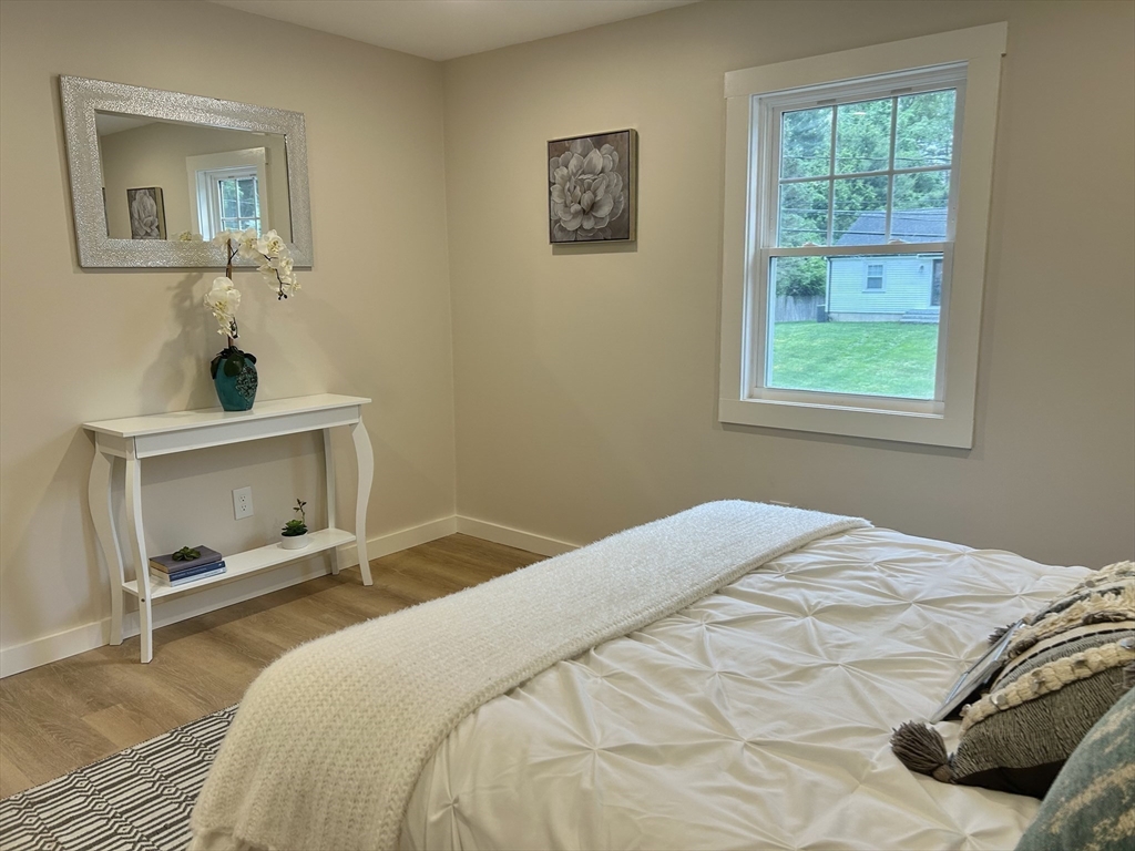 7 Edward Street Canton, MA 02021 - Photo 11 of 22 a bedroom with a bed and a window
