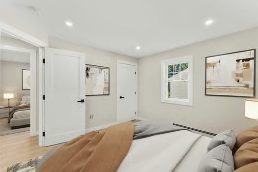 7 Edward Street Canton, MA 02021 - Photo 16 of 22 a bedroom with a bed and a couch