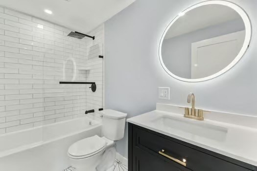 7 Edward Street Canton, MA 02021 - Photo 17 of 22 a bathroom with a toilet a sink and bathtub