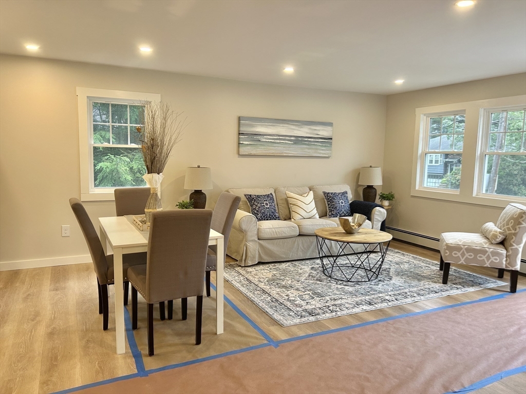 7 Edward Street Canton, MA 02021 - Photo 9 of 22 a living room with furniture and a table