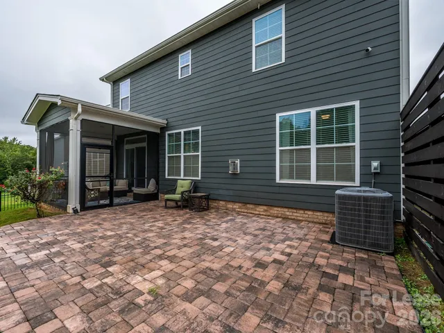 a backyard of a house with seating space
