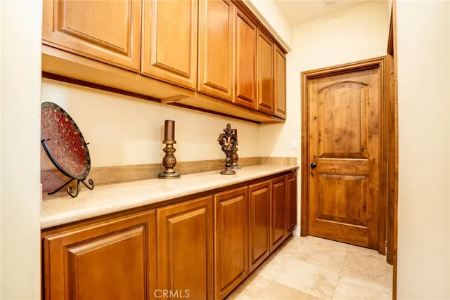 a kitchen with stainless steel appliances granite countertop a sink and cabinets