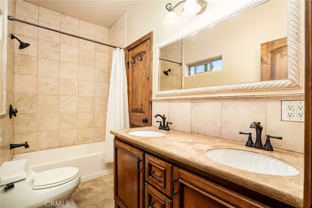5162 Edinger Avenue Huntington Beach, CA 92649 - Photo 28 of 35 JACK & JILL BATHROOM