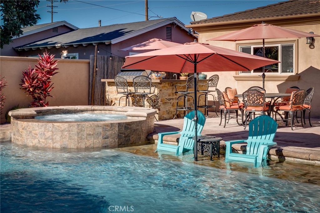 5162 Edinger Avenue Huntington Beach, CA 92649 - Photo 3 of 35 BACKYARD BAJA SHELF
WITH UNMBRELLA