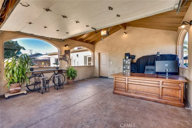 a view of a chairs and table in a room