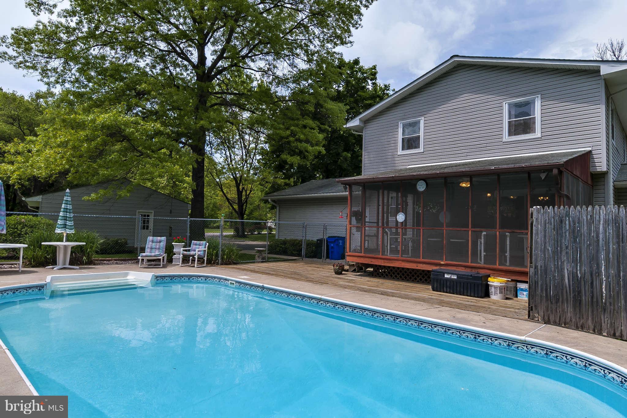 12955 Triadelphia Mill Road Clarksville, MD 21029 - Photo 20 of 29 a backyard of a house with seating space