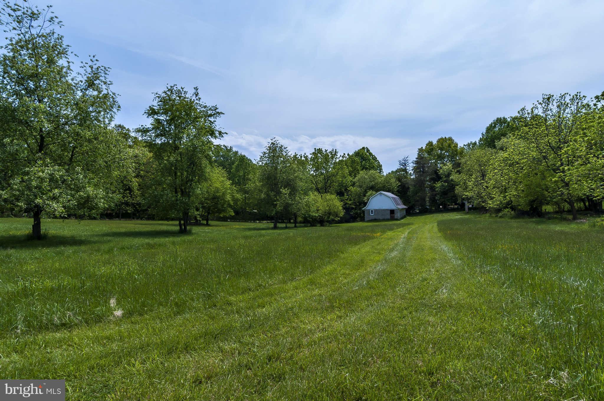 12955 Triadelphia Mill Road Clarksville, MD 21029 - Photo 23 of 29 a view of a golf course with a park