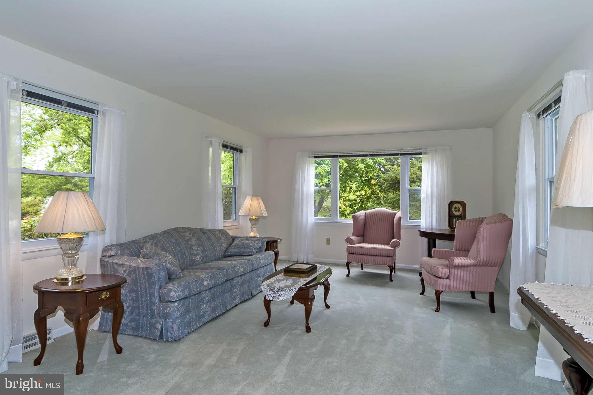 12955 Triadelphia Mill Road Clarksville, MD 21029 - Photo 6 of 29 a living room with furniture and a window
