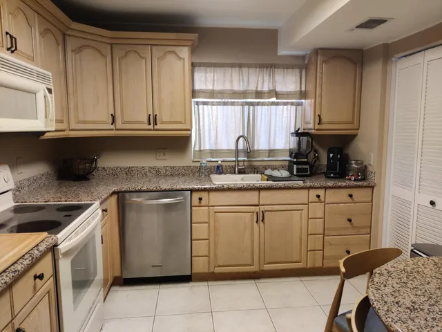 a view of balcony with furniture