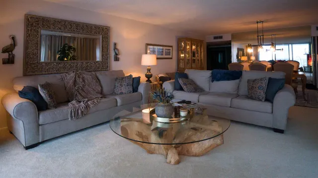 a view of a balcony with table and chairs