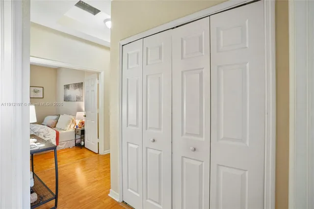 a view of a bedroom from a hallway