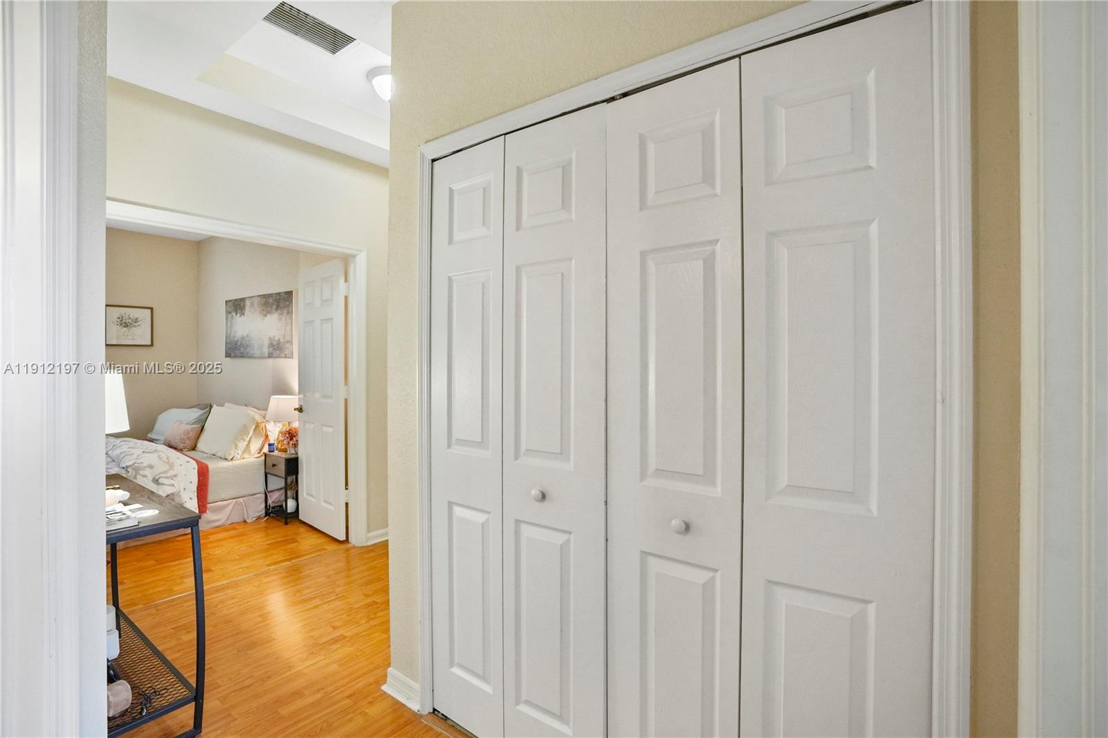 11753 Southwest 137th Path Miami, FL 33186 - Photo 13 of 33 a view of a bedroom from a hallway