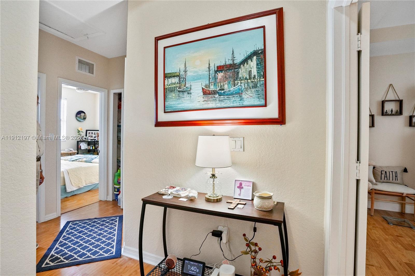 11753 Southwest 137th Path Miami, FL 33186 - Photo 15 of 33 a view of a workspace with furniture and wooden floor