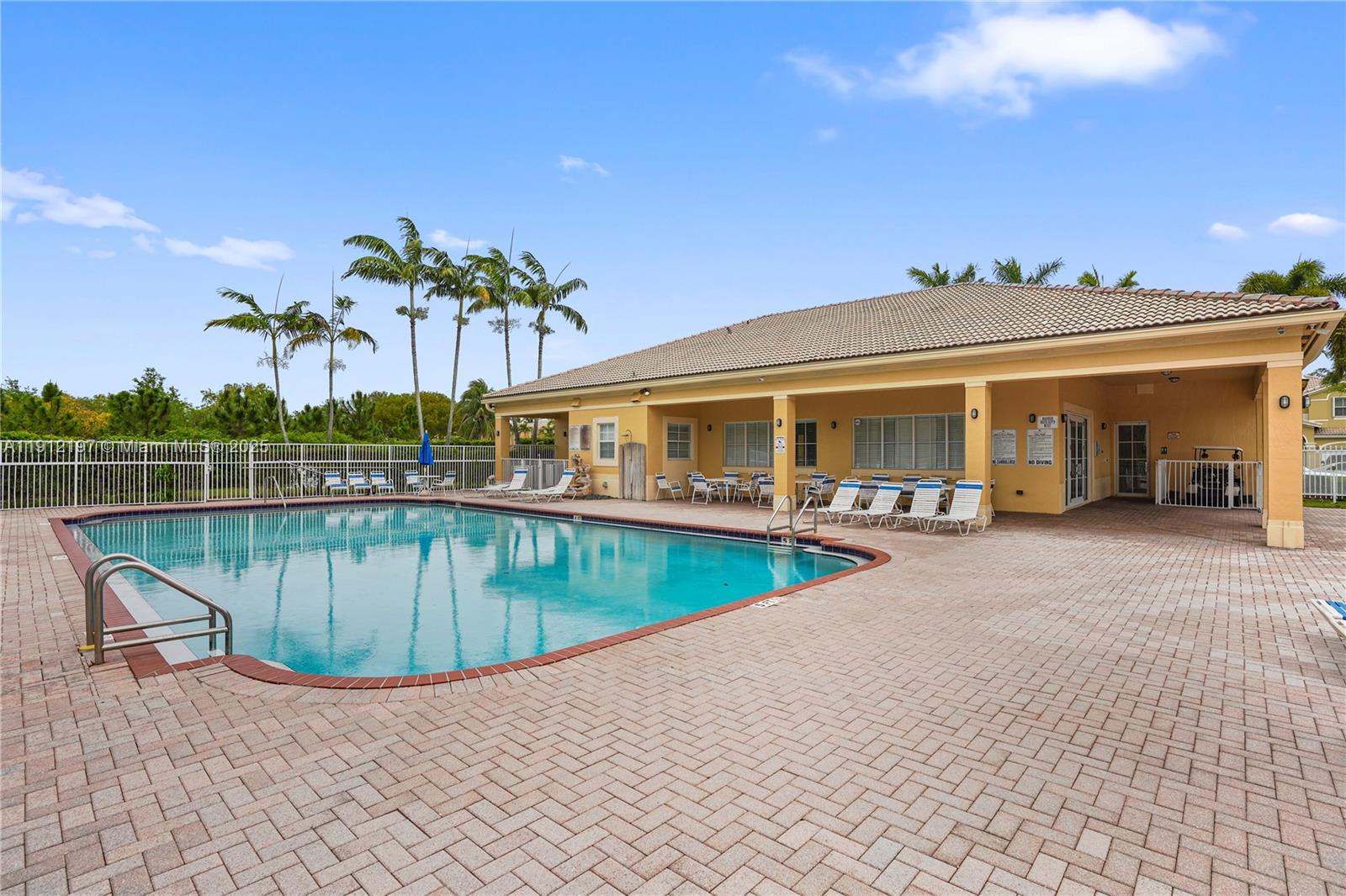 11753 Southwest 137th Path Miami, FL 33186 - Photo 32 of 33 swimming pool with outdoor seating