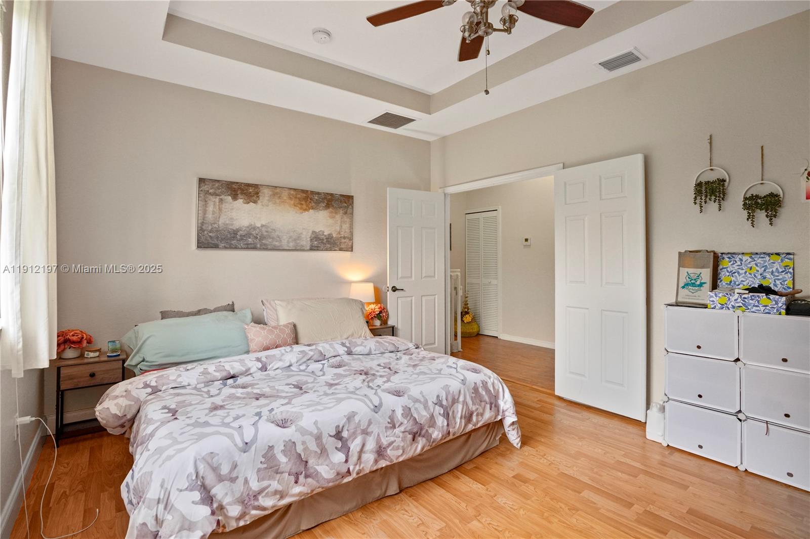 11753 Southwest 137th Path Miami, FL 33186 - Photo 5 of 33 a bedroom with a bed and a cabinets